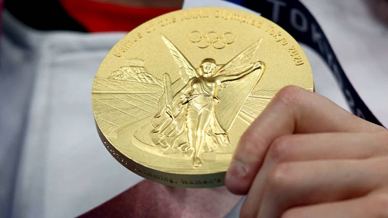 ilustrasi medali emas
