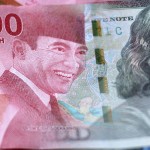 Ilustrasi mata uang rupiah dan dolar AS-1642757469