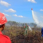 Proses pemadaman api. Antara/Ho-Humas BMKG Pekanbaru.-1693975806
