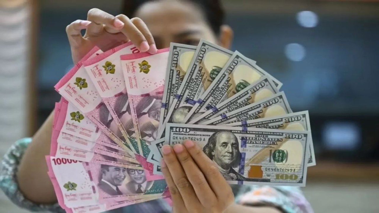 Mata uang Rupiah dan Dolar AS/ist